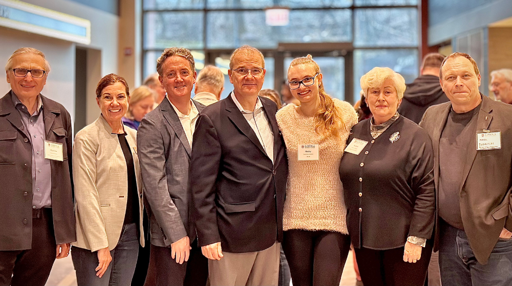 The Loyola Polish Alumni Network posing for a photo.